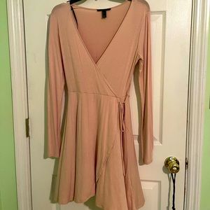 A little pink dress with long sleeves
